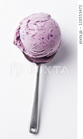 Purple berry ice cream on a metal spoon, soft creamy surface and juicy swirl details, isolated for commercial product mockups. 128553472