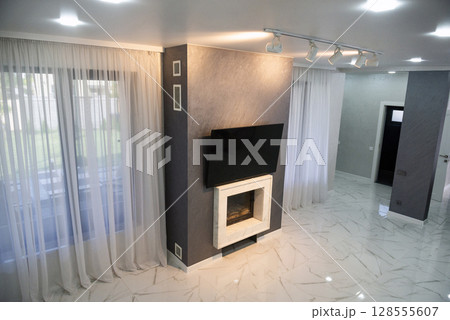 Fireplace in the living room. Fireplace in the living room. 128555607