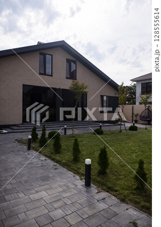 Interior house of a private household. there is a car in the yard. 128555614