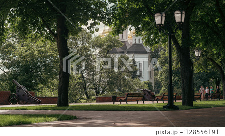The peaceful park setting enhances the spiritual aura of the scene. 128556191
