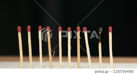 Burnt Matchstick Among New Matches – Burnout Concept 128556498