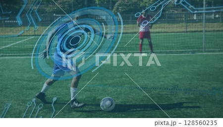 Image of scope scanning and data processing over football player kicking ball Image of scope scanning and data processing over football player kicking ball 128560235