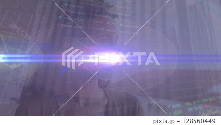 Image of data processing over woman wearing face mask 128560449