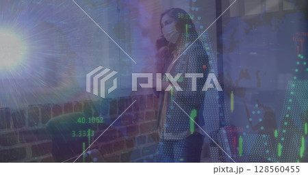 Image of data processing over woman talking on smartphone wearing face mask Image of data processing over woman talking on smartphone wearing face mask 128560455