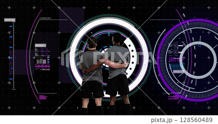 Image of two rugby players embracing with scope scanning and data processing 128560489