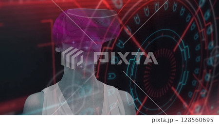 Image of scope scanning with glitch and woman using vr headset 128560695