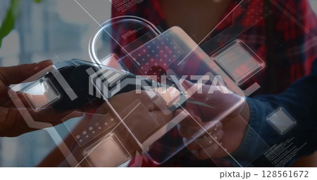 Image of network security padlock over people using payment terminal 128561672