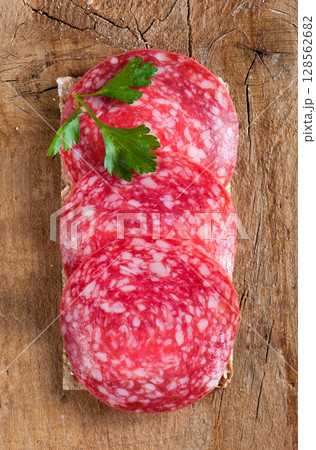 Crisp bread with salami Crisp bread with salami 128562682