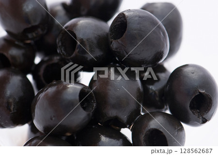 black olives isolated on a white background black olives isolated on a white background 128562687