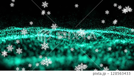 Snowflakes falling against green digital wave on black background 128563433