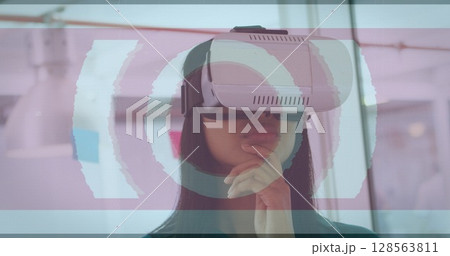 Image of scope scanning and data processing over woman wearing vr headset 128563811
