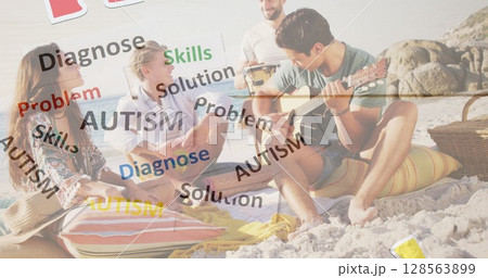 Image of colourful puzzle pieces and autism text over happy friends at summer beach party Image of colourful puzzle pieces and autism text over happy friends at summer beach party 128563899