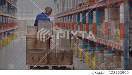 Image of data processing one man working in warehouse 128563909