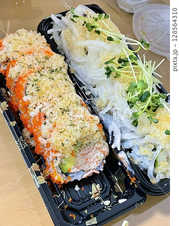Assorted sushi set, featuring a variety of traditional Japanese dishes. Perfect for a delightful and authentic Japanese dining experience. Assorted sushi set, featuring a variety of traditional Japanese dishes. Perfect for a delightful and authentic Japanese dining experience. 128564310