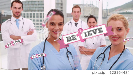 Image of pink breast cancer ribbons over group of smiling doctors Image of pink breast cancer ribbons over group of smiling doctors 128564484