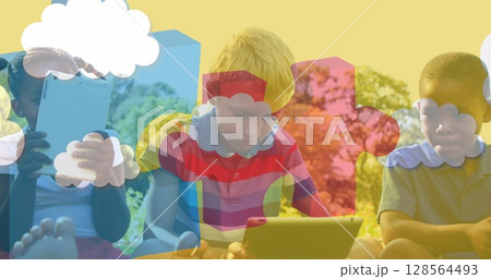 Image of colourful puzzle pieces over children using tablets 128564493
