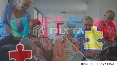 Image of colourful puzzle pieces and autism text over senior friends using tablets 128564498