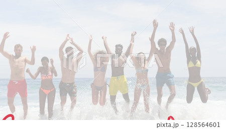 Image of red hearts over happy diverse group of friends on beach Image of red hearts over happy diverse group of friends on beach 128564601