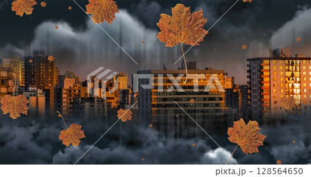 Image of orange autumn leaves falling over cityscape 128564650