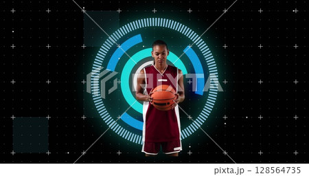 Image of african american female basketball player over scope scanning on black background 128564735