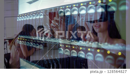 Image of computer server over schoolgirl wearing vr headsets 128564827