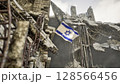 Israel Flag in War and Disaster Ruins 128566456