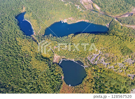 Three lakes surrounded by autumn forest from the air Three lakes surrounded by autumn forest from the air 128567520
