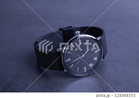 Wrist watch for women on gray background 128568353