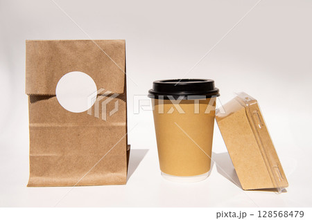 Minimalist eco-friendly brown paper lunch set with coffee cup and sandwich box 128568479