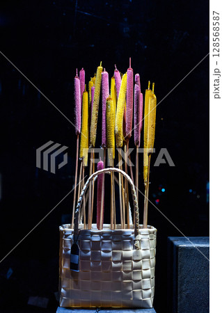 Painted Typha latifolia in wicker basket. DIY decorative cattails 128568587