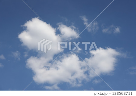 Cumulus white clouds floating on blue sky in beautiful morning. 128568711