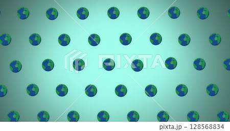 Image of globes moving on green background Image of globes moving on green background 128568834