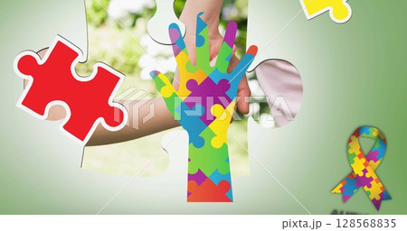 Image of colourful puzzle pieces hand over mother and child Image of colourful puzzle pieces hand over mother and child 128568835
