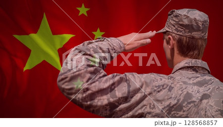 Image of flag of china over caucasian male soldier saluting 128568857