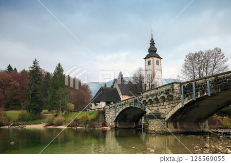 Lake Bohinj and church at sunset in Slovenia Lake Bohinj and church at sunset in Slovenia 128569055