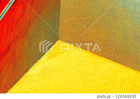 Overhanging corner of a modern office building 128569285