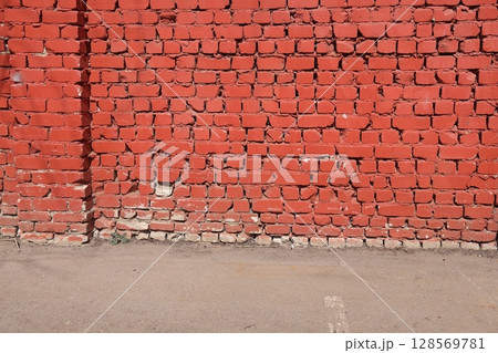 Red grunge brick wall, abstract background texture with old dirty and vintage style pattern. Red grunge brick wall, abstract background texture with old dirty and vintage style pattern. 128569781