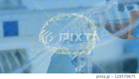 Image of dna strand and human brain over laboratory test tube 128570675