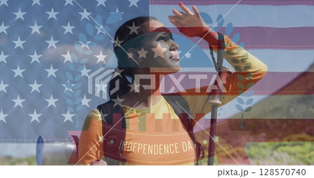 Image of independence day text over biracial woman looking away in mountains Image of independence day text over biracial woman looking away in mountains 128570740