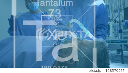 Image of chemical compounds over surgeons in operating theatre 128570935