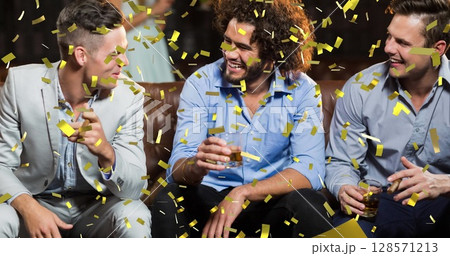 Image of gold confetti falling over happy diverse group of friends drinking in bar Image of gold confetti falling over happy diverse group of friends drinking in bar 128571213