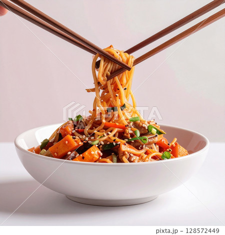 japchae, glass noodles, stir-fried veggies, soy sauce dish, beef japchae, Korean dish, holiday food, home meal, spinach, carrot strips, mushroom stir-fry, sesame oil, onion strips, party food, noodle  128572449