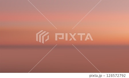 sunset background nature landscape with tranquil ocean and warm pink orange gradient sky reflecting serene water for abstract minimal summer beach scene 128572792