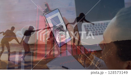 Image of caucasian woman using smartphone over female friends at beach Image of caucasian woman using smartphone over female friends at beach 128573149