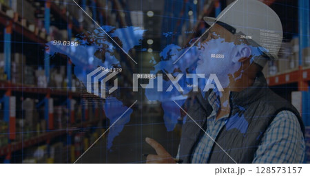 Image of financial data processing and world map over biracial worker in warehouse Image of financial data processing and world map over biracial worker in warehouse 128573157