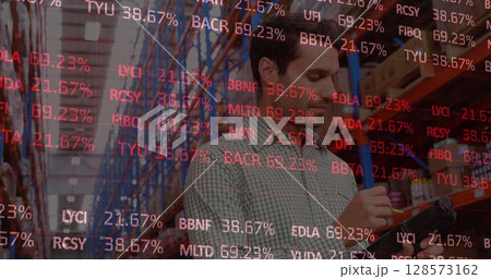Image of stock market over caucasian worker in warehouse Image of stock market over caucasian worker in warehouse 128573162