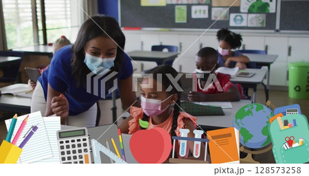 Image of school items icons over diverse schoolchildren and teacher wearing face masks 128573258