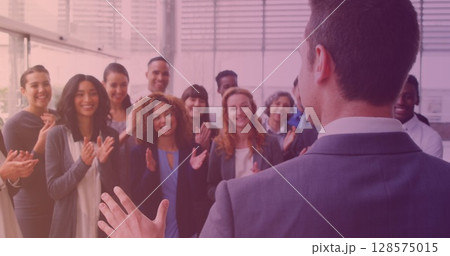 Image of smiling group of diverse business people clapping at meeting Image of smiling group of diverse business people clapping at meeting 128575015