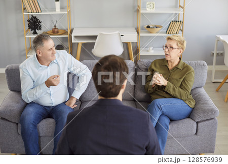 Elderly Couple In Therapy Session With Psychologist Elderly Couple In Therapy Session With Psychologist 128576939