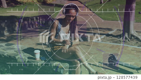 Image of scope scanning over biracial woman with scooter using smartwatch Image of scope scanning over biracial woman with scooter using smartwatch 128577439